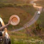 girl-with-hat-in-the-window-of-the-car-adventure-2024-06-11-17-20-32-utc_Easy-Resize.com