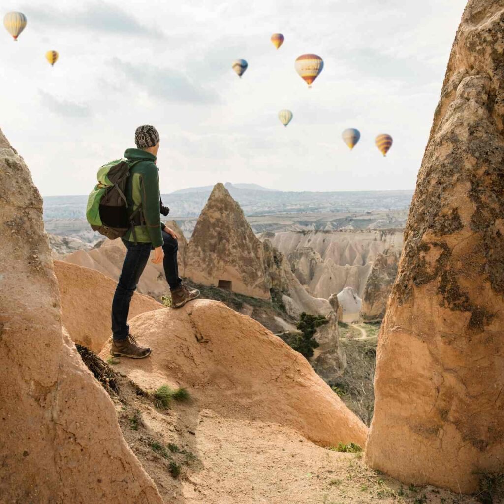 male-tourist-exploring-cappadocia-red-and-rose-val-2023-11-27-05-00-52-utc_Easy-Resize.com